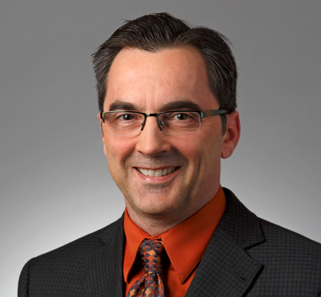 headshot of Norman Aubee