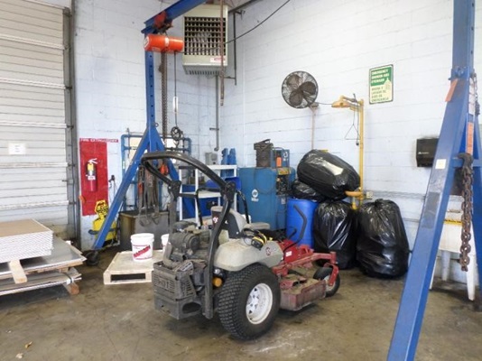 A forklift repair shop before using 5s maintenance principles